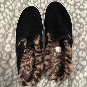 Vans woman’s size 10 black with fuzzy animal print inside. Lightly worn